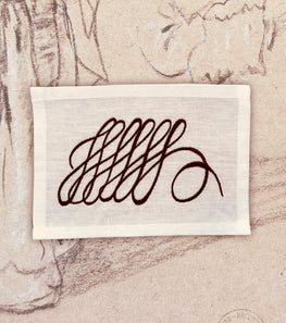 “Love Scroll” cocktail napkin </br> Giles Deacon x Peter Reed